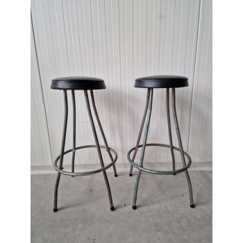 A pair of industrial style bar stools