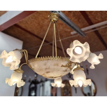 A beautiful chandelier with a marble dome