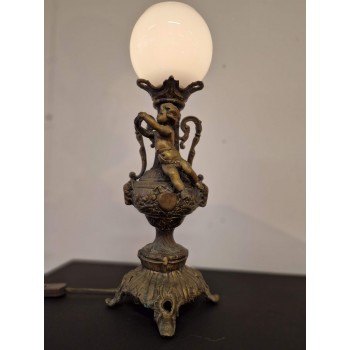 Bronze table lamp with puti