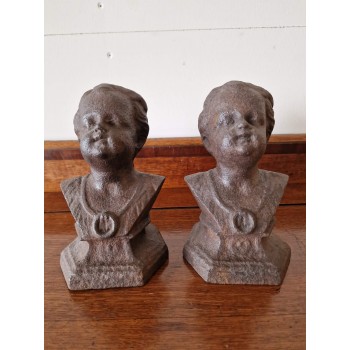 A pair of cast iron figures