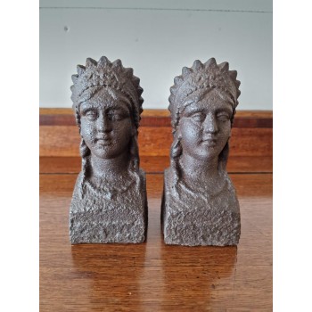 A pair of cast iron figures
