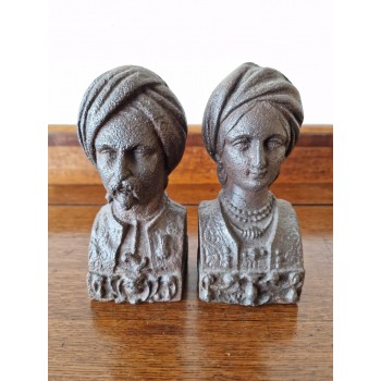 A pair of cast iron figures