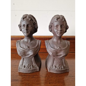 A pair of cast iron figures
