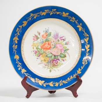 Large ornamental plate with handpainted floral decor