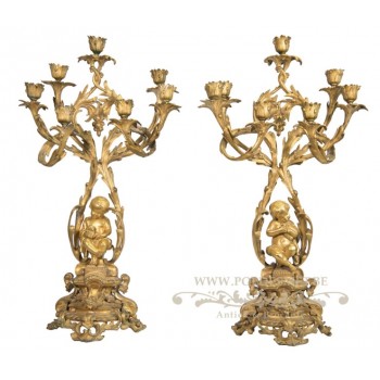 Pair of candelabra with Romantic Scene and Putti